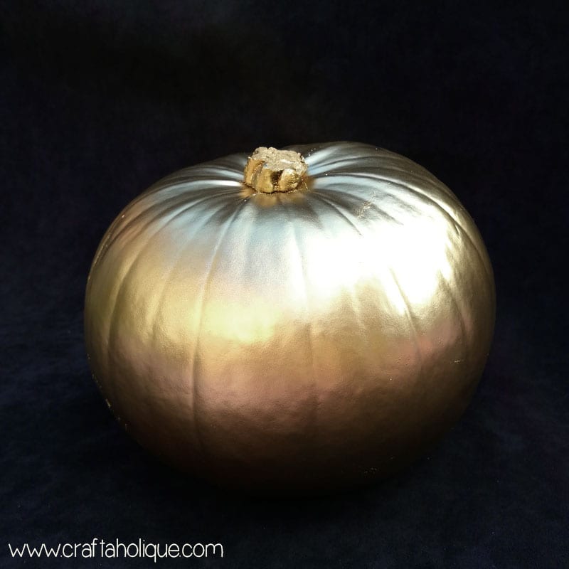 Pumpkin decorating ideas - glitzy and gold pumpkins from Craftaholique