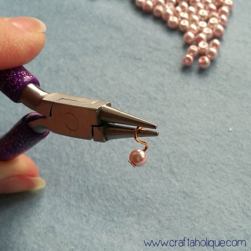Making a loop in a headpin for pearl bead component. Beaded bracelet DIY