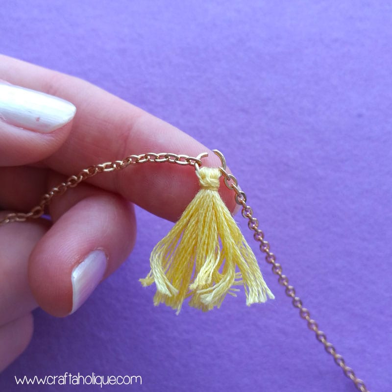 Attaching tassels to a necklace