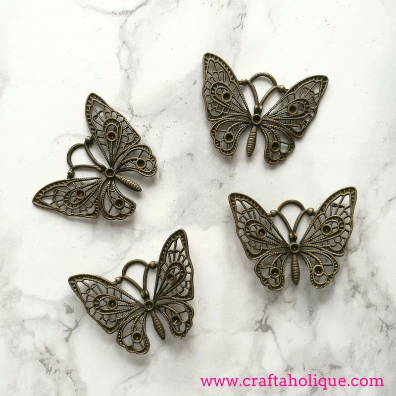 Butterfly garden decor tutorial by Craftaholique